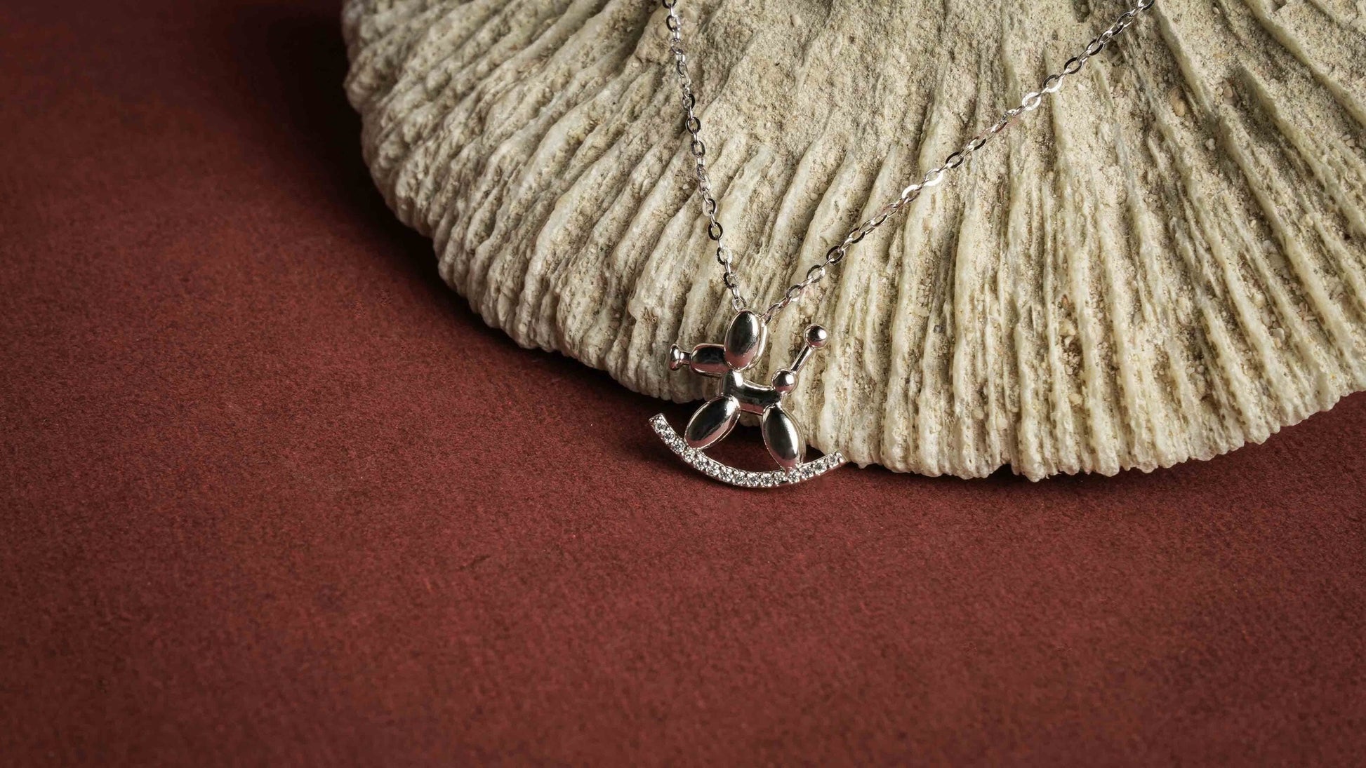 STERJOY CHARM NECKLACE